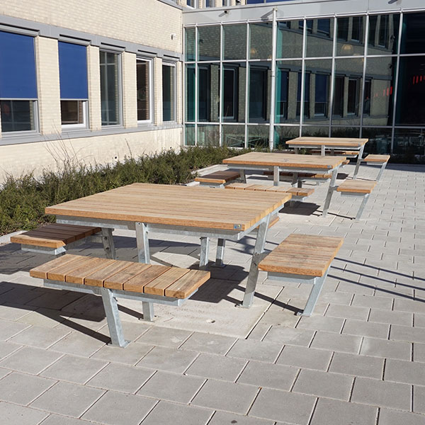 Picnic tables and litter bins at Alkwin College