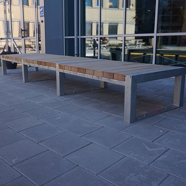 Picnic tables and litter bins at Alkwin College
