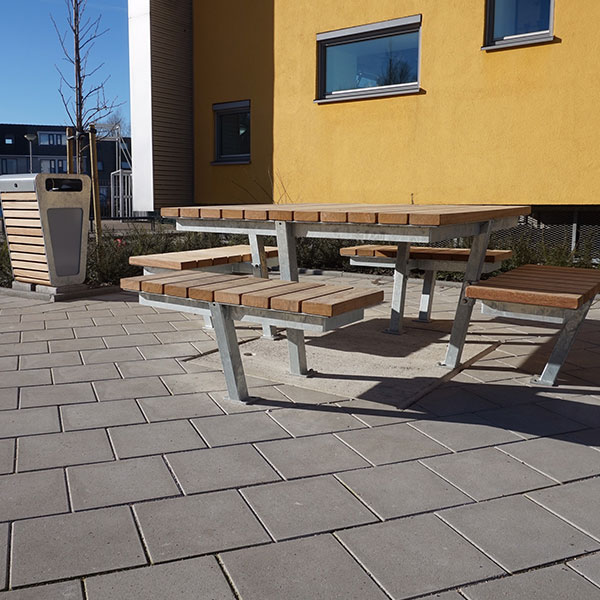 Picnic tables and litter bins at Alkwin College